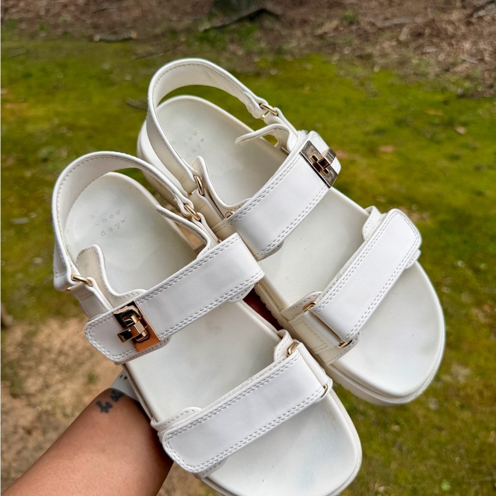 White Platform Strap Sandals with Gold Buckle Detail